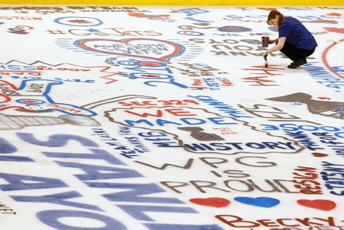 JOHN WOODS / WINNIPEG FREE PRESS
Someone paints her message at Paint The Rink at the Winnipeg Jets' arena Sunday, May 27, 2018.