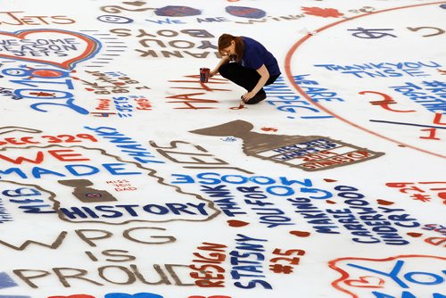 JOHN WOODS / WINNIPEG FREE PRESS
Someone paints her message at Paint The Rink at the Winnipeg Jets' arena Sunday, May 27, 2018.