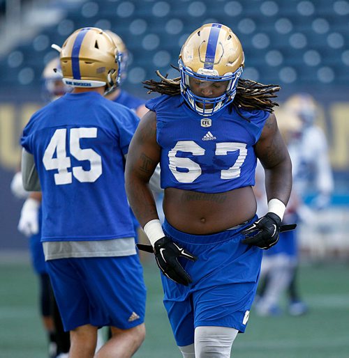 PHIL HOSSACK / WINNIPEG FREE PRESS - Bomber Cory Johnson #67 at a team workout Monday. Mike Sawatzsky story. - May 28, 2018
