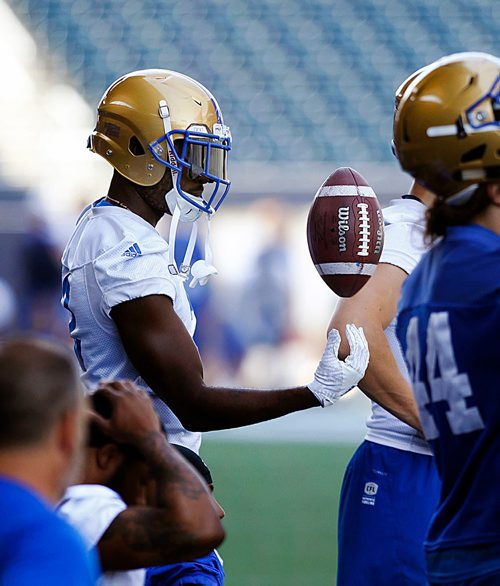 PHIL HOSSACK / WINNIPEG FREE PRESS - Bomber #2 Kenbrell Thompkins works the ball on the sidelines at a team workout Monday. Mike Sawatzsky story. - May 28, 2018