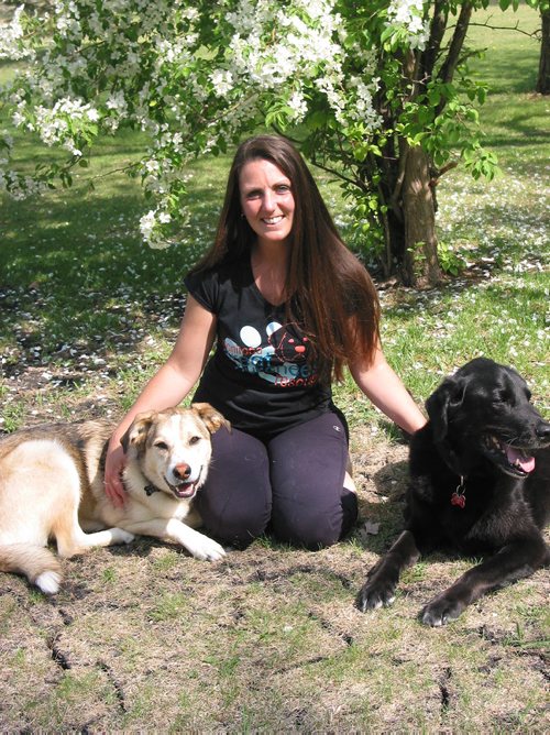 Canstar Community News May 23, 2018 - St. Francois Xavier resident Pam Negrich, shown with her dogs Jasmine and Duke, is an assistant director with Manitonba Great Pyrenees Rescue. (ANDREA GEARY/CANSTAR COMMUNITY NEWS)