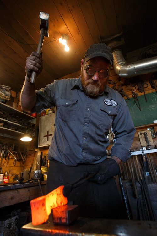 MIKE DEAL / WINNIPEG FREE PRESS
Matt Jenkins co-owner of Cloverdale Forge works on an axe head that will be on display at the Manitoba Museum in the newly renovated Nonsuch gallery.
180419 - Thursday, April 19, 2018.