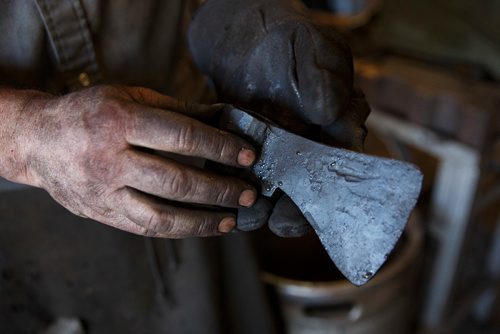 MIKE DEAL / WINNIPEG FREE PRESS
Matt Jenkins co-owner of Cloverdale Forge works on an axe head that will be on display at the Manitoba Museum in the newly renovated Nonsuch gallery.
180419 - Thursday, April 19, 2018.