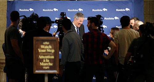 PHIL HOSSACK / WINNIPEG FREE PRESS -  Premier Brian Pallister scrums with the media after Question Period Tuesday afternoon. Larry and Jessica's story. - May 29, 2018