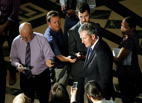 PHIL HOSSACK / WINNIPEG FREE PRESS -  Premier Brian Pallister scrums with the media after Question Period Tuesday afternoon. Larry and Jessica's story. - May 29, 2018