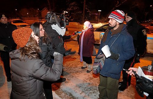 BORIS MINKEVICH / WINNIPEG FREE PRESS  090108 Protestors outside of the Asper Jewish Community Centre. Two women complain to the man on the right about handing out information papers.