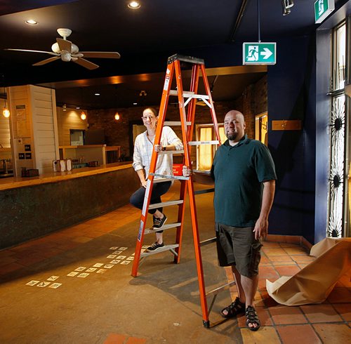 PHIL HOSSACK / WINNIPEG FREE PRESS - Peter and Samantha Vlanos pose in their new }Pete's Place location Thursday. See story. The Osborne Village location is set to open soon. - May 31, 2018
