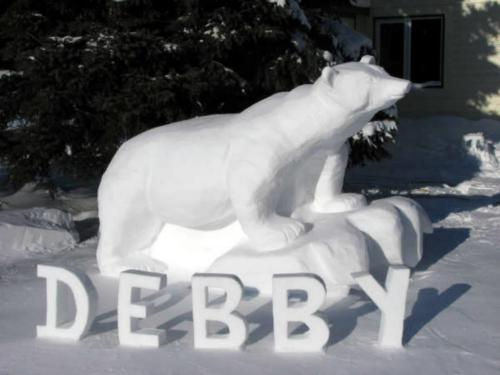 Nelson Norris from Morris, MB created this awesome snow sculpture of Debby The Polar Bear in his front yard. I think its amazing! As long as this cold weather holds up, well still have something to remember Debby by.
winnipeg free press