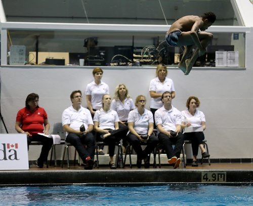 TREVOR HAGAN / WINNIPEG FREE PRESS
Yohan Eskrick-Parkinson dives in front of the judges from the 1m board at the Elite Junior Nationals, at Pan Am Pool,  Friday, June 1, 2018.