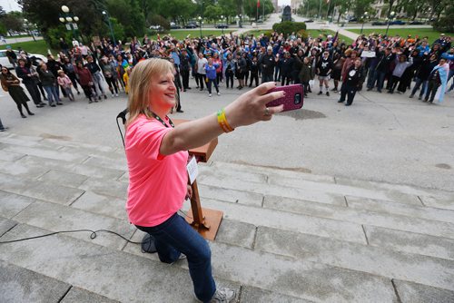 JOHN WOODS / WINNIPEG FREE PRESS
Rally organizer Shandy Strong takes a selfie with the crowd  at a transgender rally and march at the Manitoba Legislature Saturday, June 2, 2018.