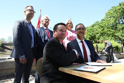 RUTH BONNEVILLE / WINNIPEG FREE PRESS


Infrastructure and Communities Minister Amarjeet Sohi (right) and Municipal Relations Minister Jeff Wharton sign documents for both governments to Invest in infrastructure programs at the Forks Monday.  
Also at presser were AMM president, Chris Goertzen,  MLA Rochelle Squires  and MP Jim Carr.

See story

June 4,  2018
