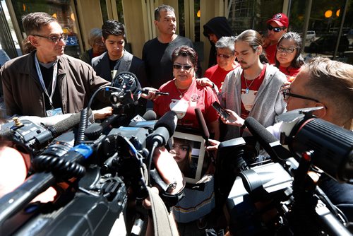 JOHN WOODS / WINNIPEG FREE PRESS
Delores Daniels, mother of Serena McKay, speaks to media  with her family outside the Manitoba law courts after one of her daughters' killers was sentenced to 40 months, 23.5 months supervision for second degree murder Monday, June 4, 2018.