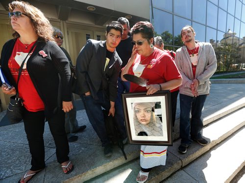 JOHN WOODS / WINNIPEG FREE PRESS
Delores Daniels, mother of Serena McKay, leaves the Manitoba law courts with her family after one of her daughters' killers was sentenced to 40 months, 23.5 months supervision for second degree murder Monday, June 4, 2018.