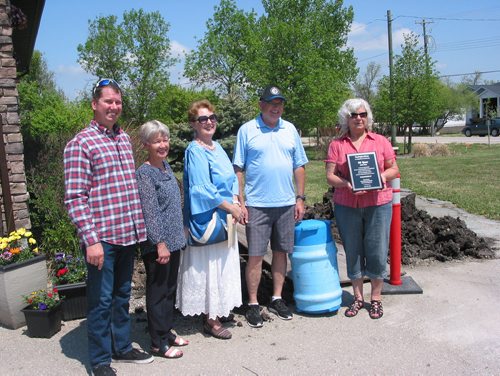 Canstar Community News May 26, 2018 - (From left) Morris MLA Shannon Martin, former Headingley Municipal Library head librarian Joan Spice, former muncipal councillor and library board chair Margaret Mills, muncipal councillor Jim Robson and current head librarian Bonnie Brook spoke at the Headingley Municipal Library's 25th anniversary community celebration on May 26. Brook holds a plaque presented by Martin to mark the anniversary. (ANDREA GEARY/CANSTAR COMMUNBITY NEWS)