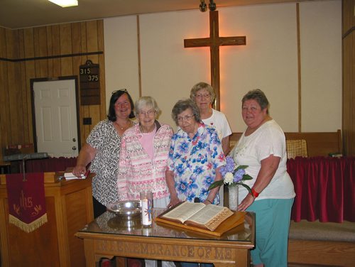 Canstar Community News May 29, 2018 - (From left) St. Charles and Headingley United Church minister Joanne Kury, and St. Charles congregation members Pat Dalton, Mabel Hedges, Donna Thompson and Betty Walker stand at the friont of St. Charles United Church, 673 Isbister St. The church has been sold and the congregation is merging with that of Headingley United Church in June. (ANDREA GEARY/CANSTAR COMMUNITY NEWS)