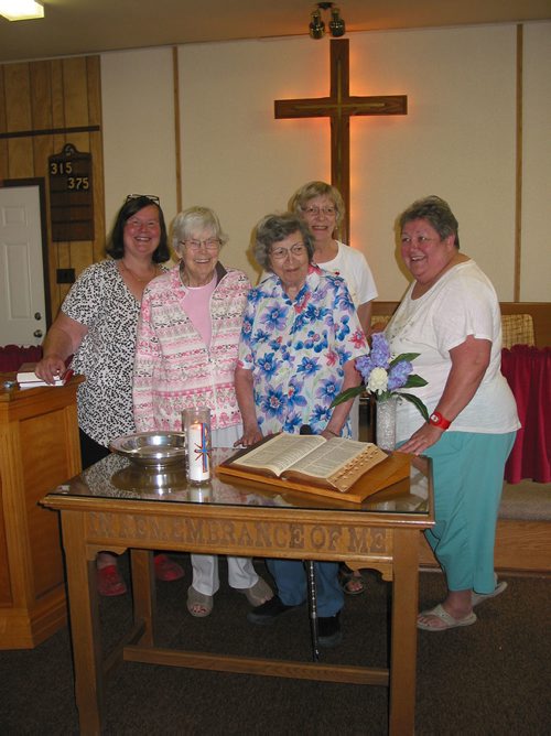 Canstar Community News May 29, 2018 - (From left) St. Charles and Headingley United Church minister Joanne Kury, and St. Charles congregation members Pat Dalton, Mabel Hedges, Donna Thompson and Betty Walker stand at the friont of St. Charles United Church, 673 Isbister St. The church has been sold and the congregation is merging with that of Headingley United Church in June. (ANDREA GEARY/CANSTAR COMMUNITY NEWS)