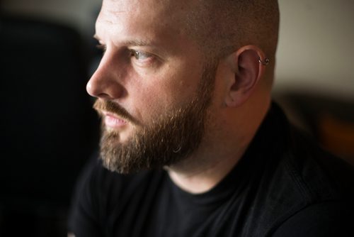 MIKAELA MACKENZIE / WINNIPEG FREE PRESS
Jeff Bromley, who released his first book of poetry, Feast, earlier this spring, poses in his home in Winnipeg on Tuesday, June 5, 2018. It was a best-seller at McNally in March and has shipped copies as far as New Zealand and Iraq. 
Mikaela MacKenzie / Winnipeg Free Press 2018.