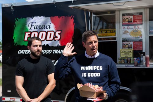 ANDREW RYAN / WINNIPEG FREE PRESS Winnipeg Mayor Brian Bowman speaks to press after trying the Pizza Pops recipe as originally made by the late Paul Faraci on June 5, 2018. Faraci's nephew Phil and his son Anthony decided to remake the recipe after its originator passed in February.