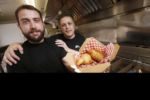 Anthony Faraci and his father Phil photographed in their food truck as they relaunch his late uncle Paul Faraci's original Pizza Pop - Paul's Original Pizza Snack (POPS) in Winnipeg, Tuesday, June 5, 2018.  THE CANADIAN PRESS/John Woods
