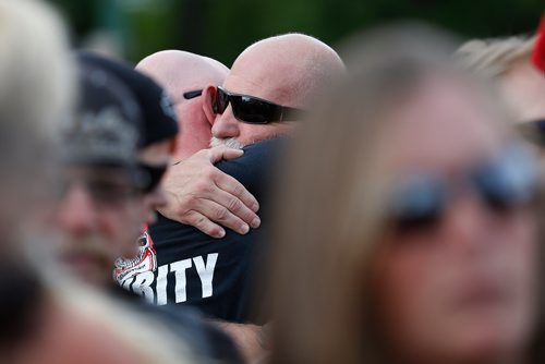JOHN WOODS / WINNIPEG FREE PRESS
Family, friends and supporters gathered at the corner of Portage and Home Tuesday, June 5, 2018 to remember Robert Benson, aka Matt Cave, who was killed in a motorcycle collision with a stolen van.