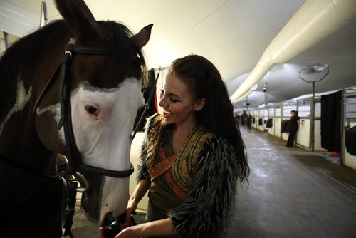 RUTH BONNEVILLE / WINNIPEG FREE PRESS

Cavalia Odysseo

Feature on Day in the life of a professional rider and her horse.  Photos shadowing  a Odysseo rider, Chelsea Jordan, and her horse pair (Utah,mostly, brown, but also other horses), as they get ready for the show   prepping for the performance, makeup, hair, costume, rehearsals, pre-show rituals with rider/horse, some shots of show during water scene and  post-show wind down, shower, groom and treat time. 
Photos taken on May 31, 2018.
Chelsea washes down her favourite horse, Utah, after the show. 

See Erin Lebar story
June 5,  2018
