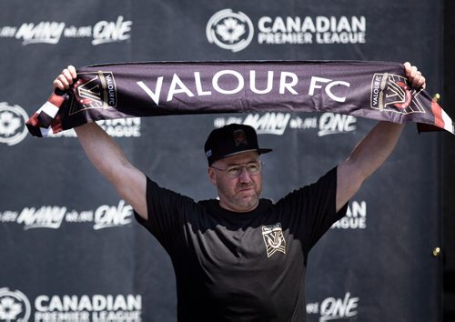 ANDREW RYAN / WINNIPEG FREE PRESS Radio personality Ace Burpee hold's the new Valour FC scarf at the Canadian Premeire league's unveiling of Winnipeg's new mens soccer team on June 6, 2018.