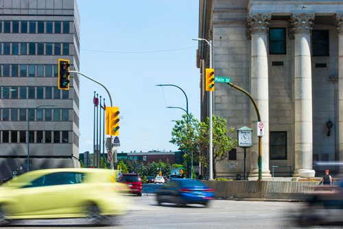 MIKAELA MACKENZIE / WINNIPEG FREE PRESS
Portage and Main in Winnipeg on Wednesday, June 6, 2018. City hall expects the first barriers to be taken down to allow pedestrians to cross Portage Avenue East, between the Richardson Plaza and the Bank of Montreal.
Mikaela MacKenzie / Winnipeg Free Press 2018.