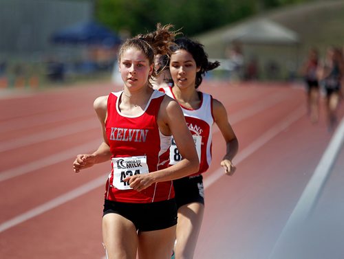PHIL HOSSACK / WINNIPEG FREE PRESS - Kelvin's Erin Valgardson sets the pace in the Sr Women's 1500 metre event followed closely by Steinbach's Tracy Towns Thursday. See story. - June 7, 2018