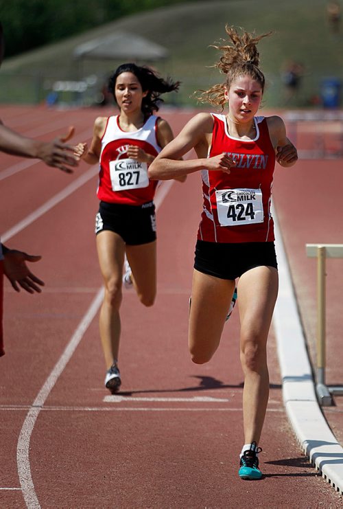 PHIL HOSSACK / WINNIPEG FREE PRESS - Kelvin's Erin Valgardson crosses the finish line in the Sr Women's 1500 metre event followed closely by Steinbach's Tracy Towns Thursday. See story. - June 7, 2018