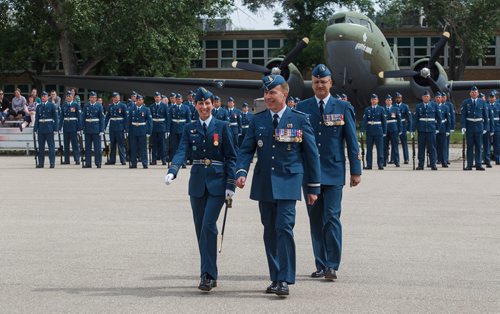 MIKE DEAL / WINNIPEG FREE PRESS
Brigadier-General Sean Boyle (centre), Deputy Commander 1 Canadian Air Division, Major Véronique Gagné (left), RCAF Public Duties Air Task Force Commander, and HQ Chief Warrant Officer Serge Laforge, 1 Canadian Air Division, after reviewing the contingent of the RCAF during one of their final practices at 17 Wing Winnipeg before heading to London to perform Public Duties for Her Majesty Queen Elizabeth II from June 25th to July 15th.
180608 - Friday, June 08, 2018.