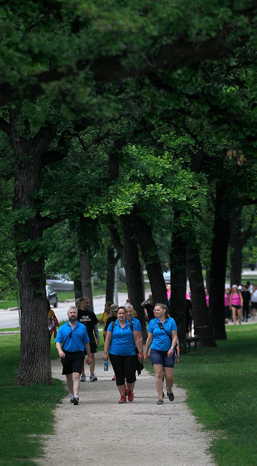 PHIL HOSSACK / WINNIPEG FREE PRESS -  Walkers make their way down Wellington Crescent's shaded walking path towards the finish line Saturday afterooon at the Challenge for Life  walk in support of Cancer Care.  See Ashley Prest story. - June 9, 2018