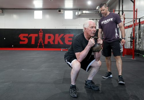TREVOR HAGAN / WINNIPEG FREE PRESS
Trainer, Paul Dyck, right, and his father, Lorne Dyck, at Starke Strength and Conditioning, Sunday, June 10, 2018.
