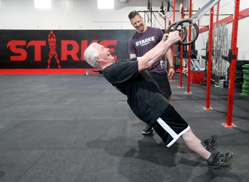 TREVOR HAGAN / WINNIPEG FREE PRESS
Trainer, Paul Dyck, right, and his father, Lorne Dyck, at Starke Strength and Conditioning, Sunday, June 10, 2018.