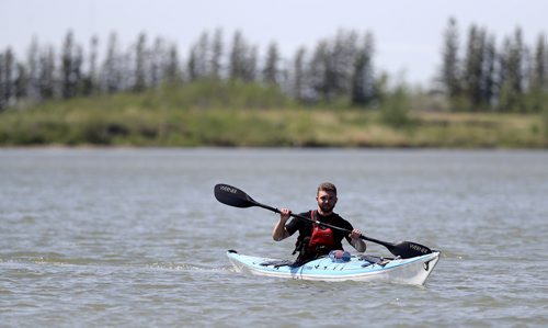 TREVOR HAGAN / WINNIPEG FREE PRESS
Alex Martin, 18, here at FortWhyte during the MEC Paddlefest, will be attempting a solo kayak trip around Lake Winnipeg later this summer, Sunday, June 10, 2018.