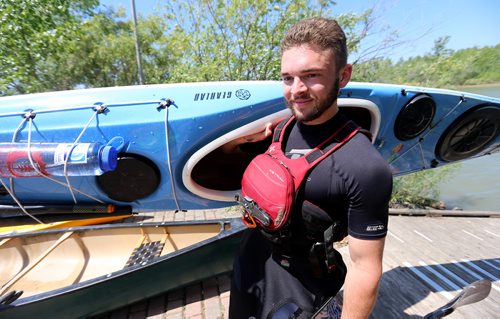 TREVOR HAGAN / WINNIPEG FREE PRESS
Alex Martin, 18, here at FortWhyte during the MEC Paddlefest, will be attempting a solo kayak trip around Lake Winnipeg later this summer, Sunday, June 10, 2018.