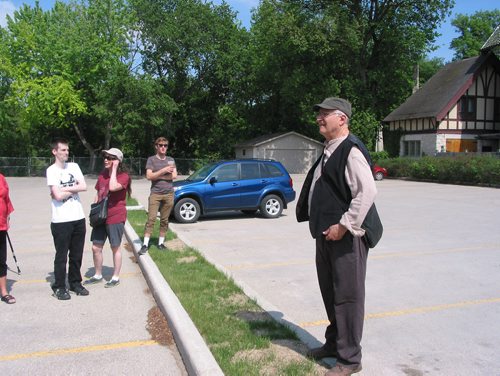 Canstar Community News May 27, 2018 - The 1919 Winnipeg General Strike tour stopped in River Heights next to what was once the mansion owned by the Ashdown family, and one of many stately homes in the area owned by wealthy families in the early part of the century. These families commonly employed recent immigrants who travelled from the North End to work as housemaids and gardeners. (ANDREA GEARY/CANSTAR COMMUNITY NEWS)