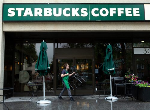 ANDREW RYAN / WINNIPEG FREE PRESS A Starbucks locks up the patio chairs ahead of the scheduled 2:30 p.m. close on June 11, 2018. The early closure is part of a continent-wide shut down after a racially insensitive incident drew international attention and prompted racial sensitivity training.