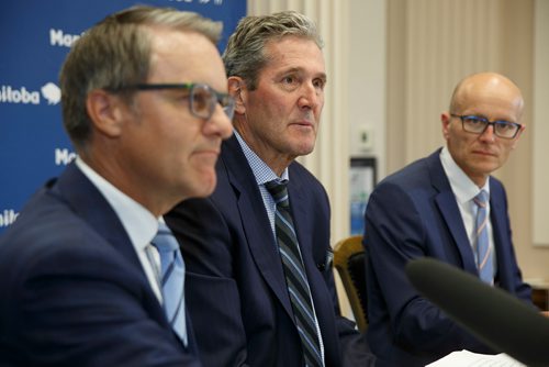 MIKE DEAL / WINNIPEG FREE PRESS
Manitoba Premier Brian Pallister (centre), Minister of Finance Cameron Friesen (left) and Fred Meier, clerk of the executive council (right) during an announcement of recipients for the Transformation Capital Fund.
180611 - Monday, June 11, 2018.