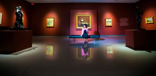 MIKAELA MACKENZIE / WINNIPEG FREE PRESS
University of Winnipeg professor Serena Keshavjee poses at the WAG in the Summer with the Impressionists exhibition in Winnipeg on Monday, June 11, 2018. Keshavjee will be hosting tours of the exhibit once it opens.
Mikaela MacKenzie / Winnipeg Free Press 2018.