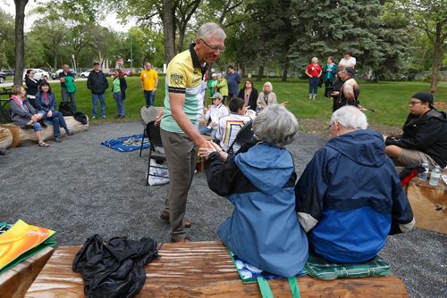 JOHN WOODS / WINNIPEG FREE PRESS
Anglican Bishop Robert Hardwick, who is cycling across Canada for healing and reconciliation with indigenous people, greets parishioners prior to smudge ceremony at the Truth and Reconciliation Healing Garden Monday, June 11, 2018.