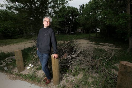 PHIL HOSSACK / WINNIPEG FREE PRESS - Ken Klassen poses in a vacant lot near his home, it's also in the way of the St James Bridge expansion. While a similar lot across the lane from this is well kept by the city, this one is seldom mowed and trash piles up. SOme of the issues he talked about with Aldo Santin. See that story.- June 14, 2018