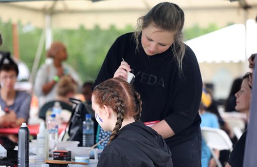 RUTH BONNEVILLE / WINNIPEG FREE PRESS

Standup KIK Picnic
A girl gets sparkles in her hair after getting it braided by Sydney, a volunteer with Aveda Institute Winnipeg at the 17th annual Kids in Kare (KIK) Picnic, at the Forks Thursday.   The KIK Picnic is a private event held at the Forks for approximately 800 foster children, foster parents and children from Emergency Placement Shelters served by Child and Family Services of Winnipeg, Eastman and the Interlake.



More Info:
The KIK Picnic is more than just a fun, free event. Its a place where foster children can relax in an informal environment and meet others just like them. And most of all, for this day, kids just get to be kids!

The picnic is often the highlight of the year for many foster children and their families. Siblings who may not live in the same home get a chance spend time together. And staff whose day-to-day work can be stressful can enjoy a pleasant afternoon with other staff and their foster families.

June 14, 2018
