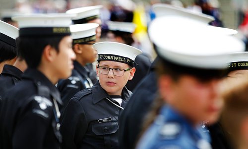 PHIL HOSSACK / WINNIPEG FREE PRESS - STAND-UP - Members of Canada's Sea Cadets and Navy League paraded at the Manitoba Legislature Saturday afternoon. A sea cadet peers around him at the sea of white dress cap and military pomp.  See release/story?- June 16, 2018