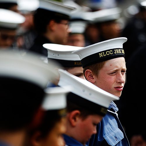 PHIL HOSSACK / WINNIPEG FREE PRESS - STAND-UP - Members of Canada's Sea Cadets and Navy League paraded at the Manitoba Legislature Saturday afternoon. A navy leaque cadet peers around him at the sea of white dress cap and military pomp.  See release/story?- June 16, 2018