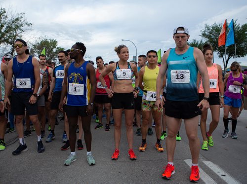 ANDREW RYAN / WINNIPEG FREE PRESS Manitoba Full Marathon contestants line up at the start line on June 17, 2018. #13 is Corey Gallagher, the eventual winner of the Men's full marathon. #9 is Amy Feit, the winner of the Women's full marathon.