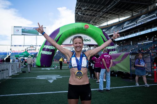 ANDREW RYAN / WINNIPEG FREE PRESS Manitoba women's winner Amy Feit after she crossed the finish line with a total time of 03:02:50 on June 17, 2018.