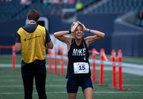 ANDREW RYAN / WINNIPEG FREE PRESS Jenna Ginsberg as she crosses the finish line of the 40th Manitoba marathon finishes on June 17, 2018.