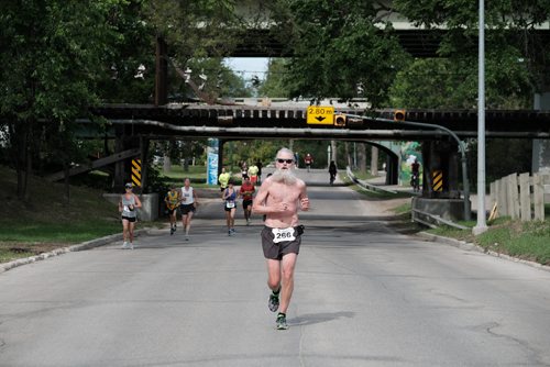 Daniel Crump / Winnipeg Free Press. Don Regehr makes his way along the Wellington Crescent portion of the full marathon route. The 40th Manitoba Marathon, Sunday, June 17, 2018.