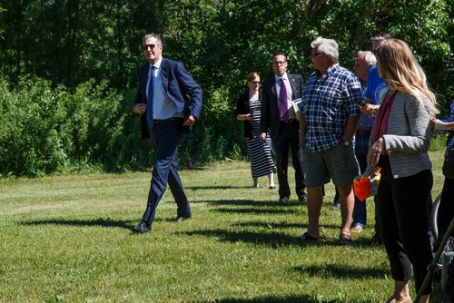 MIKE DEAL / WINNIPEG FREE PRESS
Premier Brian Pallister arrives for an announcement with Jim Carr, Federal Minister of Natural Resources Canada, for a $540 million infrastructure project for flood management of the Lake Manitoba and Lake St. Martin outlet channels at an event at Parc Gros Arbre, off Allard Road close to St. Laurent, Manitoba, Monday morning.
180618 - Monday, June 18, 2018.