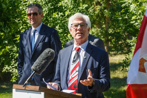 MIKE DEAL / WINNIPEG FREE PRESS
MP Jim Carr talks during the announcement with 
Premier Brian Pallister for a $540 million infrastructure project for flood management of the Lake Manitoba and Lake St. Martin outlet channels at an event at Parc Gros Arbre, off Allard Road close to St. Laurent, Manitoba, Monday morning.

180618 - Monday, June 18, 2018.